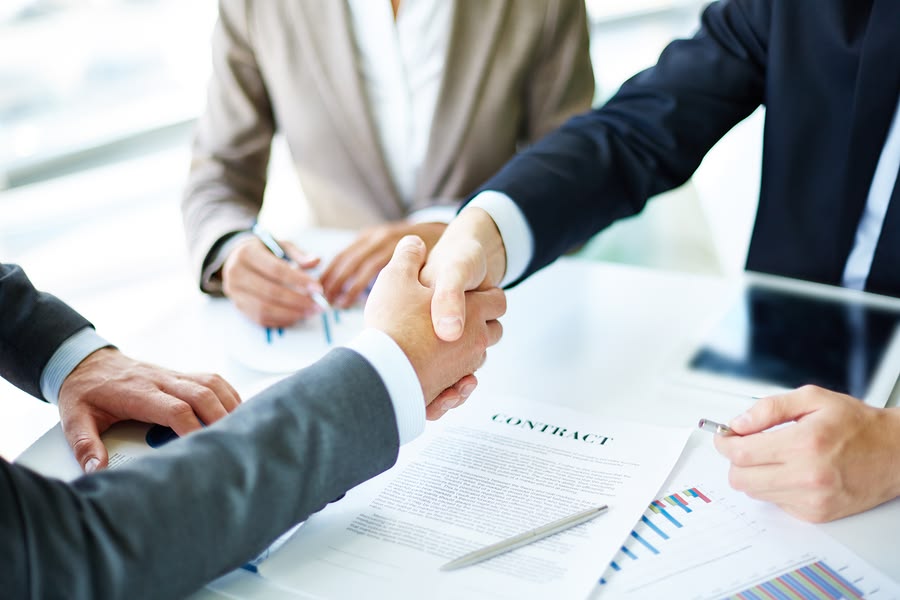 Financial professionals collaborating in a modern office